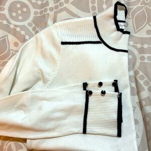 Retrology mock turtleneck white with black accents. 3 button accent on wrist!